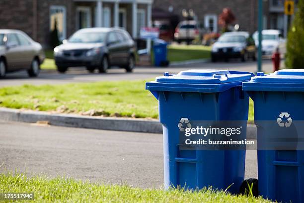 recycle bin in front of the street - recycling bin stock pictures, royalty-free photos & images