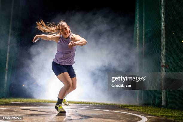 Discus In Track And Field 9,372 Female Discus Throwers Stock Photos, High-Res Pictures, and ...