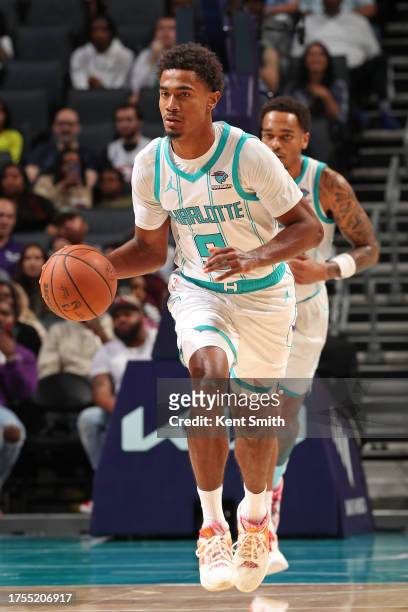 Theo Maledon of the Charlotte Hornets brings the ball up court against the Brooklyn Nets on October 30, 2023 at Spectrum Center in Charlotte, North...