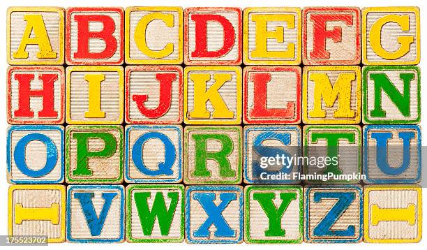 abc's, alphabet spelled out with antique toy blocks. - toy block stock pictures, royalty-free photos & images