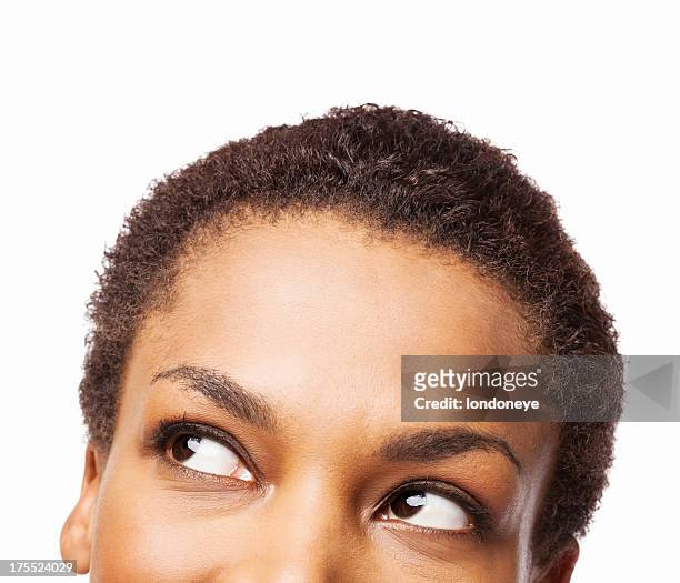african american woman looking up - isolated - sideways glance stock pictures, royalty-free photos & images