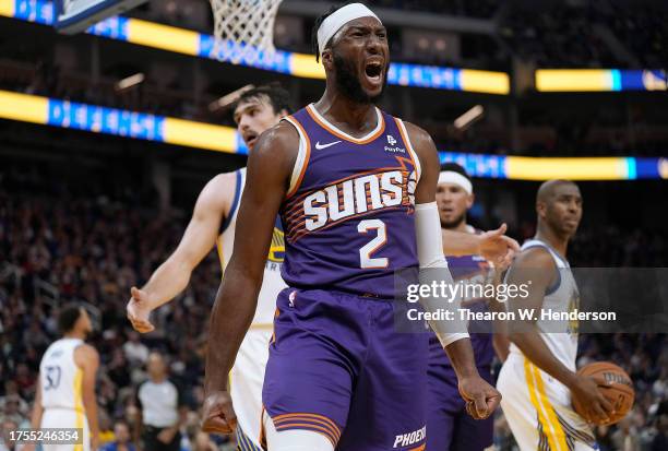 Josh Okogie of the Phoenix Suns reacts after he was fouled making a shot over Dario Saric of the Golden State Warriors during the second quarter at...
