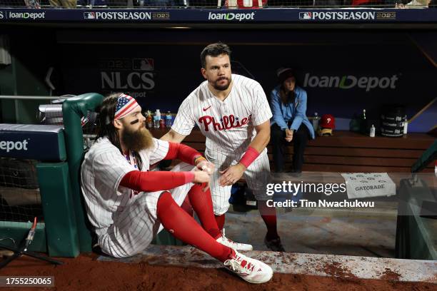 Brandon Marsh and Kyle Schwarber of the Philadelphia Phillies react after losing to the Arizona Diamondbacks 4-2 in Game Seven of the Championship...
