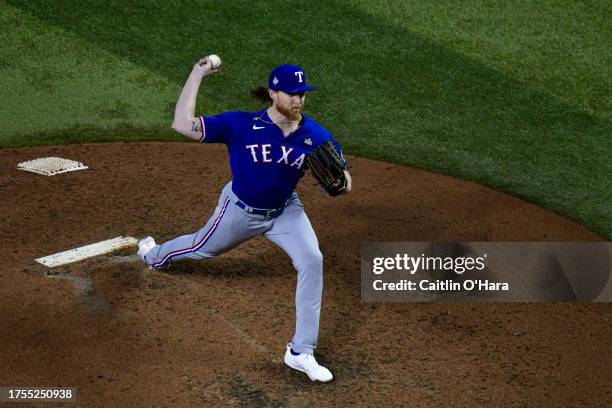 Jon Gray of the Texas Rangers pitches during Game 3 of the 2023 World Series between the Texas Rangers and the Arizona Diamondbacks at Chase Field on...