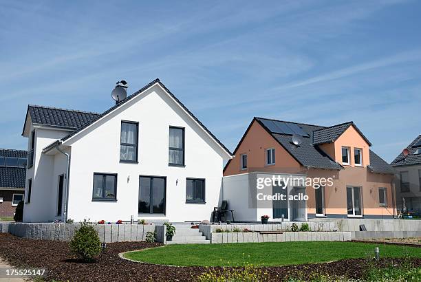 two new basic family houses - detached house stock pictures, royalty-free photos & images