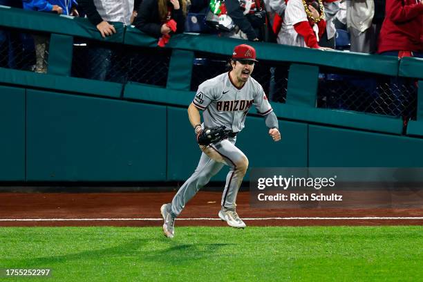 Corbin Carroll of the Arizona Diamondbacks celebrates after making the final out against the Philadelphia Phillies to win Game Seven of the...