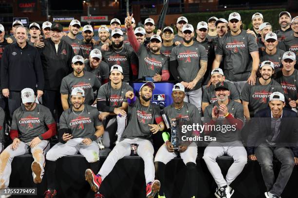 The Arizona Diamondbacks celebrate winning Game Seven of the Championship Series against the Philadelphia Phillies at Citizens Bank Park on October...