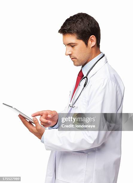 doctor using a digital tablet - isolated - doctor side view stock pictures, royalty-free photos & images