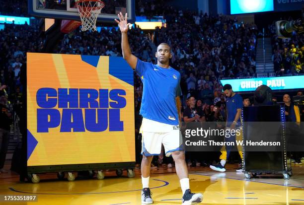Chris Paul of the Golden State Warriors is introduced to the fans during player introductions prior to the start of the game against the Phoenix Suns...