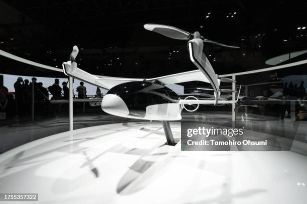 Model of electric vertical take-off and landing aircraft is displayed in the Honda Motor Co. Booth during the Japan Mobility Show at Tokyo Big Sight...