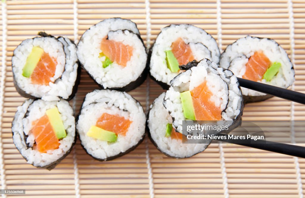 Sushi with chopsticks