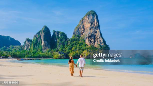 A couple of men and women at Railay Beach Krabi Thailand, the tropical beach of Railay Krabi