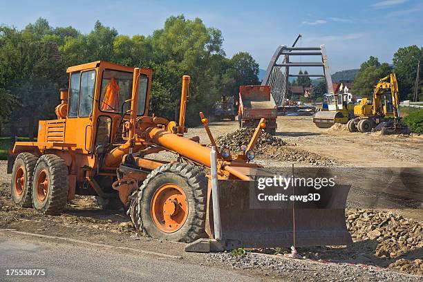 grader at work - tyre bridge stock pictures, royalty-free photos & images