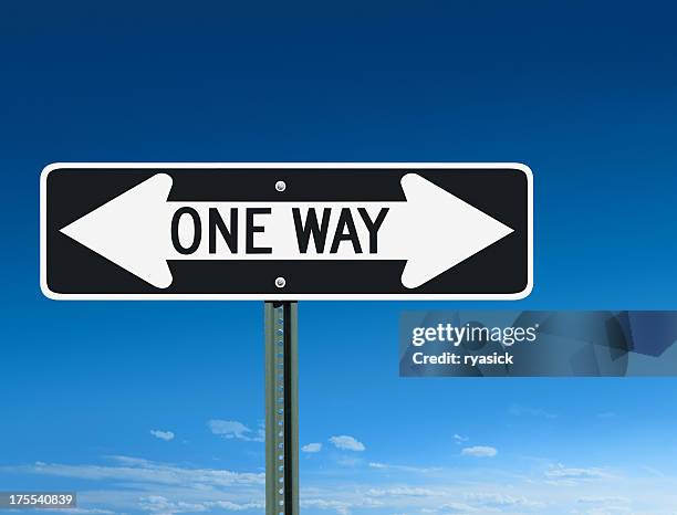 one way confusion sign with left & right arrows - one way communication stock pictures, royalty-free photos & images