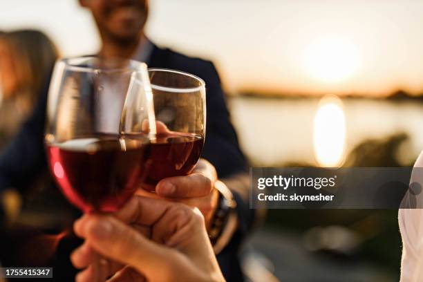 cheers! - red wine stock pictures, royalty-free photos & images