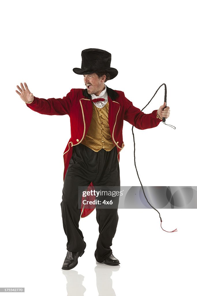 Ringmaster perfroming with a whip