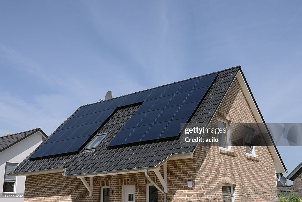 New basic house with solar panels on the roof