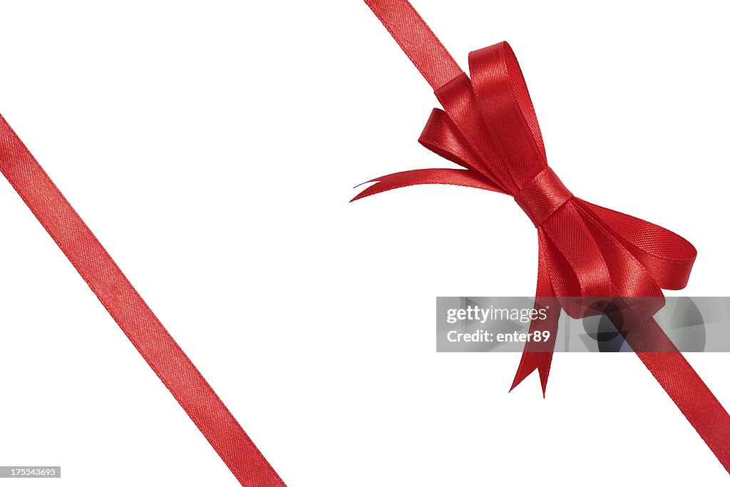 Red bow wrapped around white background