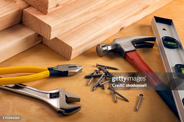 construction equipment on wood - hammer wrench stock pictures, royalty-free photos & images