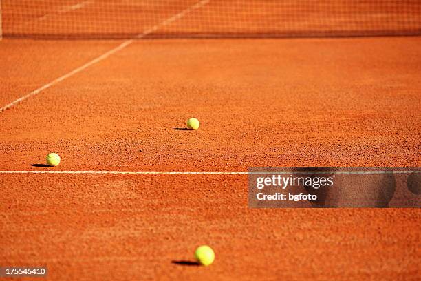 tennis ball - clay stock-fotos und bilder