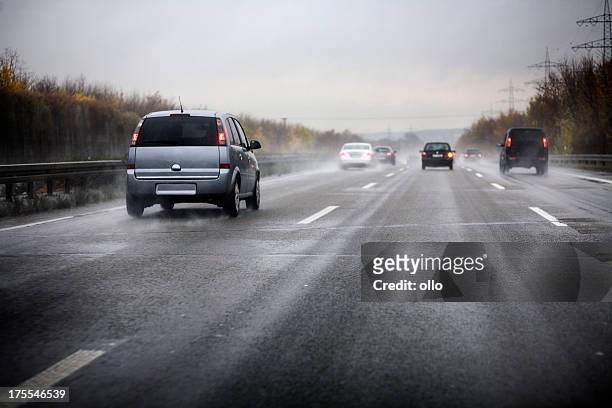 german motorway, bad weather conditions - väg bildbanksfoton och bilder