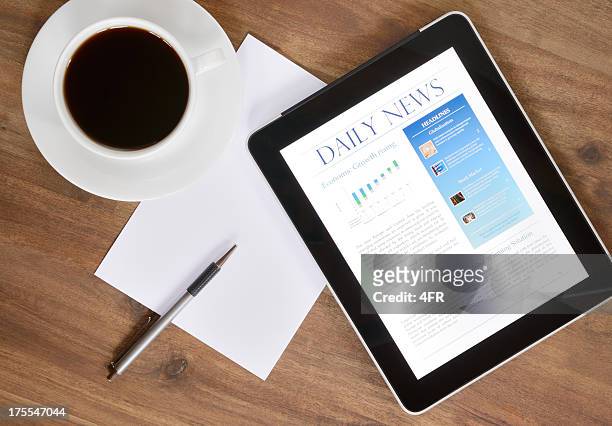 digital tablet pc with news on desk (xxxl) - the media stock pictures, royalty-free photos & images