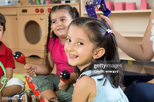Preschoolers Using Instruments Kindergarten Musical Instruments Photos and Premium High Res Pictures ...