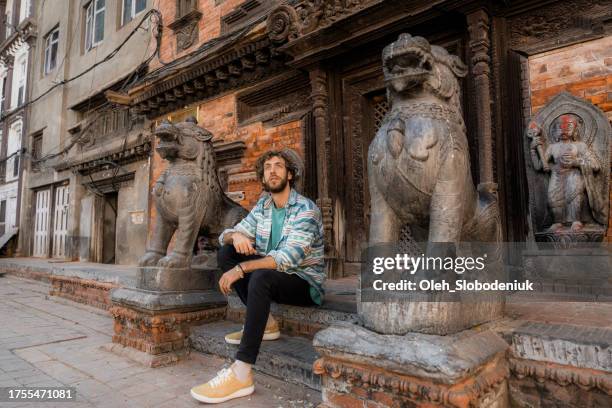 man exploring kathmandu old town - gap year stock pictures, royalty-free photos & images