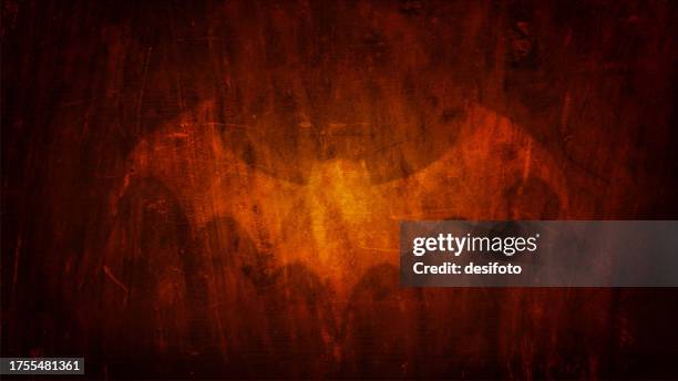 dark brown colored horror spooky rustic halloween theme horizontal wood texture effect background with one flying bat silhouette with wings spread wide open over wooden textured backdrop on rough scratched weathered wall - fly poster wall stock illustrations