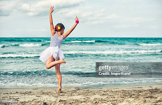 little dancer on the beach - girls dancing stock pictures, royalty-free photos & images