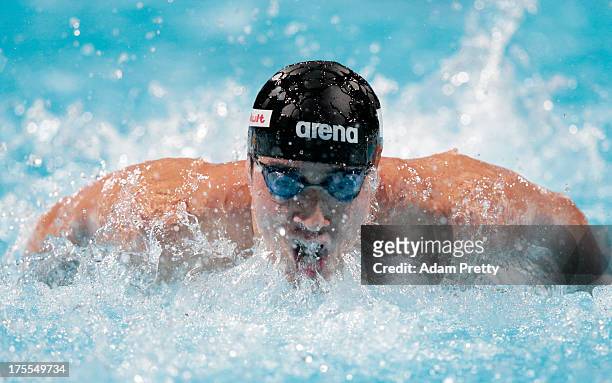 Takuro Fujii of Japan competes during the Swimming Men's 4x100m Medley Relay preliminaries heat one on day sixteen of the 15th FINA World...
