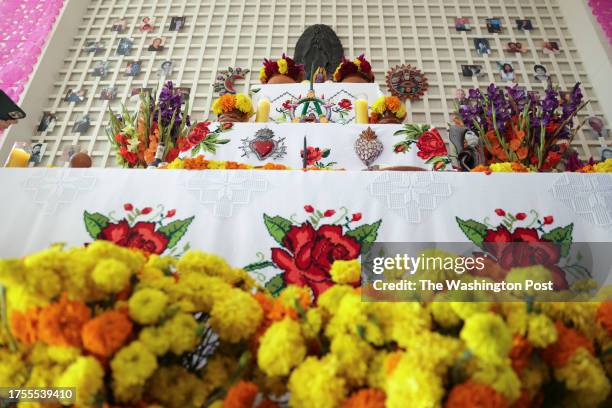 Display of an 'ofrenda' is seen in celebration of 'Dia De Los Muertos' in the West Garden Room to honor and celebrate the lives of loved ones who...