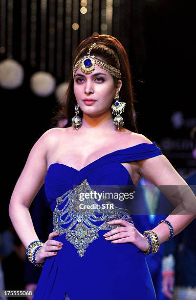 Miss India Ankita Shorey inaugurates the 4th edition of India International Jewellery Week in Mumbai on August 4, 2013. AFP PHOTO