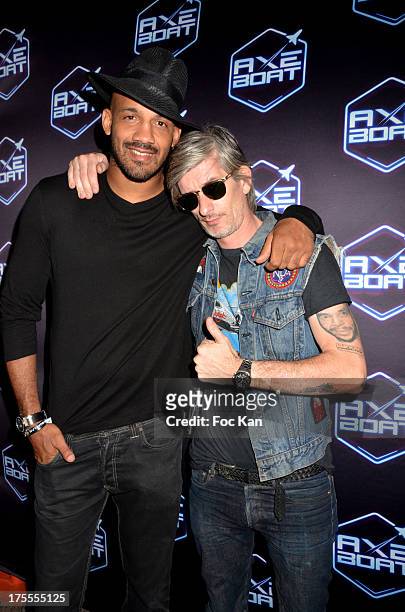 Kickboxer Cyrille Diabate and Kavinsky attend the Axe Boat 2013 Launch Party at Cannes Harbourg on August 3, 2013 in Saint Tropez, France.