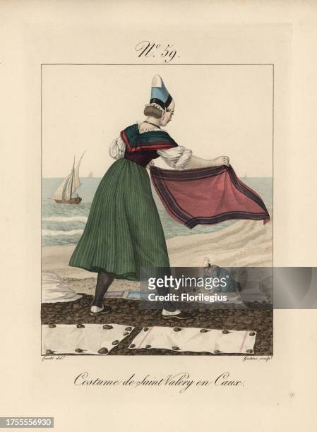 Costume of St. Valery en Caux. The bonnet is covered with blue silk and black velvet. The white shoes with black or blue bases were a fashionable...