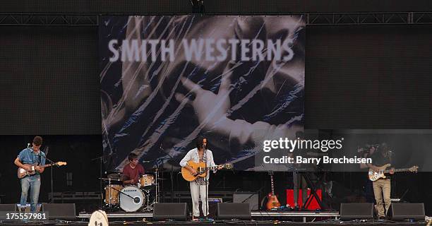 Band members of Smith Westerns during Lollapalooza 2013 at Grant Park on August 2, 2013 in Chicago, Illinois.