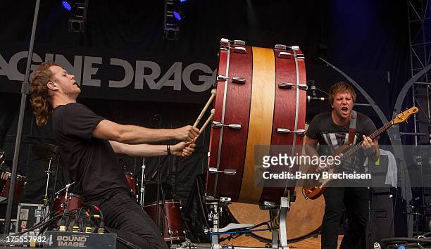 Dan Reynolds and Ben McKee of Imagine Dragons perform during Lollapalooza 2013 at Grant Park on August 2, 2013 in Chicago, Illinois.