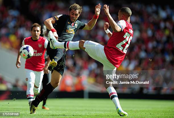 Johan Elmander of Galatasaray battles with Kieran Gibbs of Arsenal during the Emirates Cup match between Arsenal and Galatasaray at the Emirates...