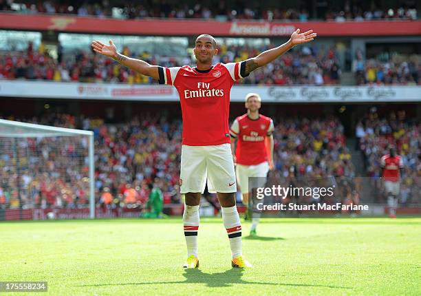 Arsenal's Theo Walcott celebrates his goal during the Emirates Cup match between Arsenal and Galatasaray at the Emirates Stadium on August 04, 2013...