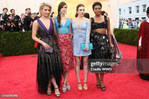 Dianna Agron in Miu Miu, Stacy Martin in Miu Miu, Elizabeth Olsen in Miu Miu and Gabrielle Union in Prada attend the Metropolitan Museum of Art\'s...