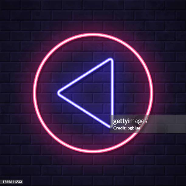 previous button. glowing neon icon on brick wall background - hitting red button stock illustrations