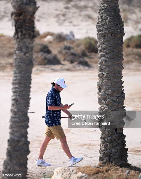 Ewen Ferguson of Scotland walking to the 11th tee during the pro-am event prior to the Commercial Bank Qatar Masters at Doha Golf Club on October 25,...