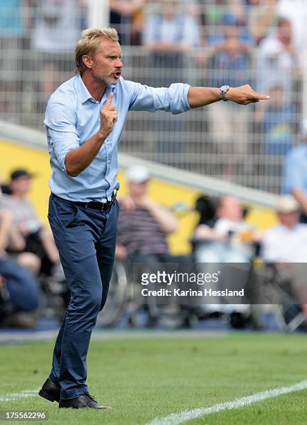 Head Coach Thorsten Fink of Hamburg reacts during the DFB Cup between SV Schott Jena and Hamburger SV at Ernst-Abbe-Sportfeld on August 04, 2013 in...