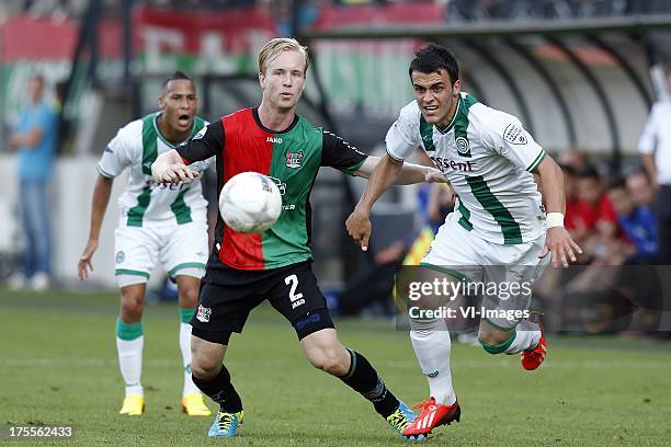 Daan Bovenberg of NEC , Filip Kostic of FC Groningen during the Dutch Eredivisie match between NEC Nijmegen and FC Groningen on August 3, 2013 at the...