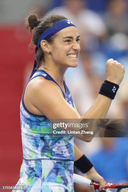 Caroline Garcia of France celebrates victory in the women's singles 1st round match against Madison Keys of United States on Day 2 of the WTA Elite...