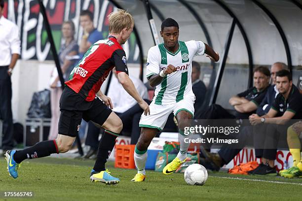 Giliano Wijnaldum of FC Groningen , Daan Bovenberg of NEC during the Dutch Eredivisie match between NEC Nijmegen and FC Groningen on August 3, 2013...