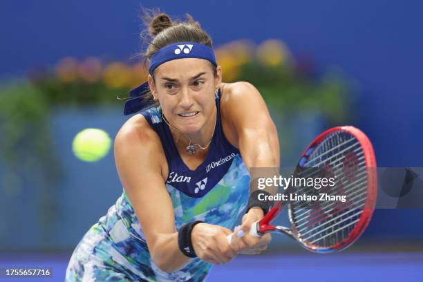 Caroline Garcia of France in action against Madison Keys of United States in the women's singles 1st round match on Day 2 of the WTA Elite Trophy...