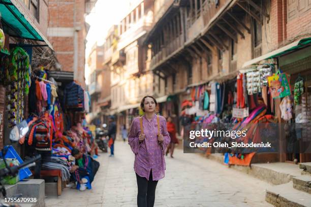 woman choosing souvenirs in kathmandu, nepal - patan stock pictures, royalty-free photos & images