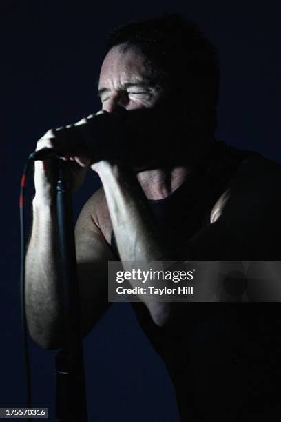 Trent Reznor of Nine Inch Nails performs during Lollapalooza 2013 at Grant Park on August 2, 2013 in Chicago, Illinois.