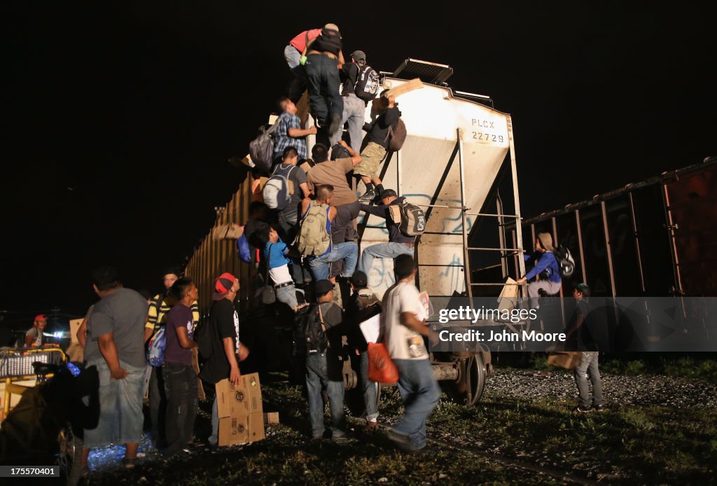 Migrants Navigate Mexican-Guatemalan Border As Part Of Grueling Journey To U.S.